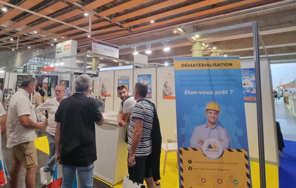 Visite d'artisans au stand Mediabat